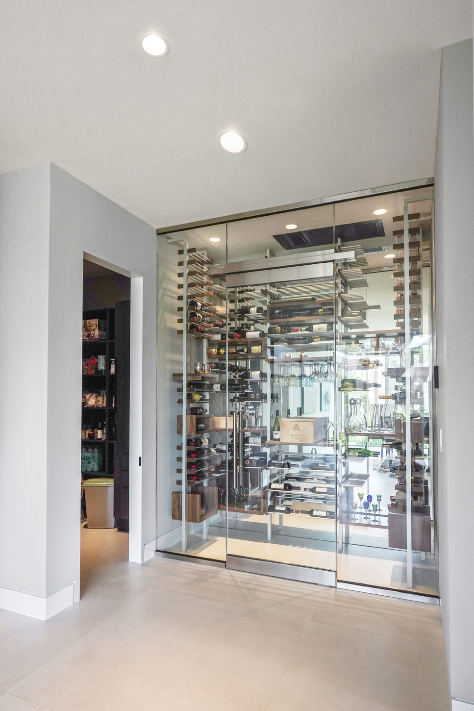 Glass-enclosed custom wine room