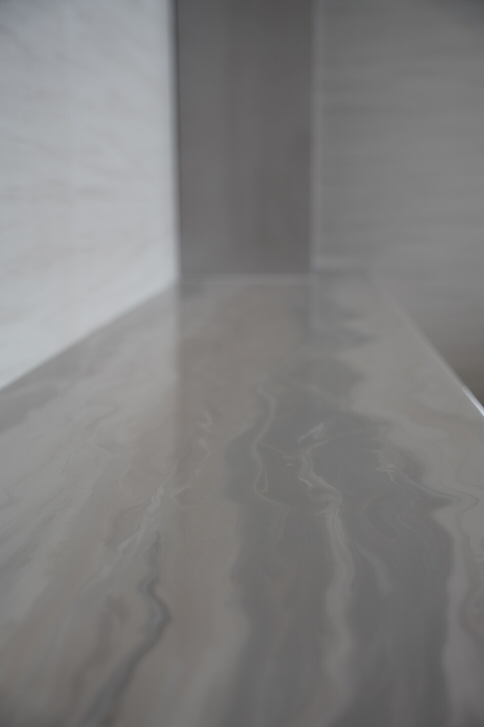 Imitation stone console corner detail with controlled-sheen epoxy coating