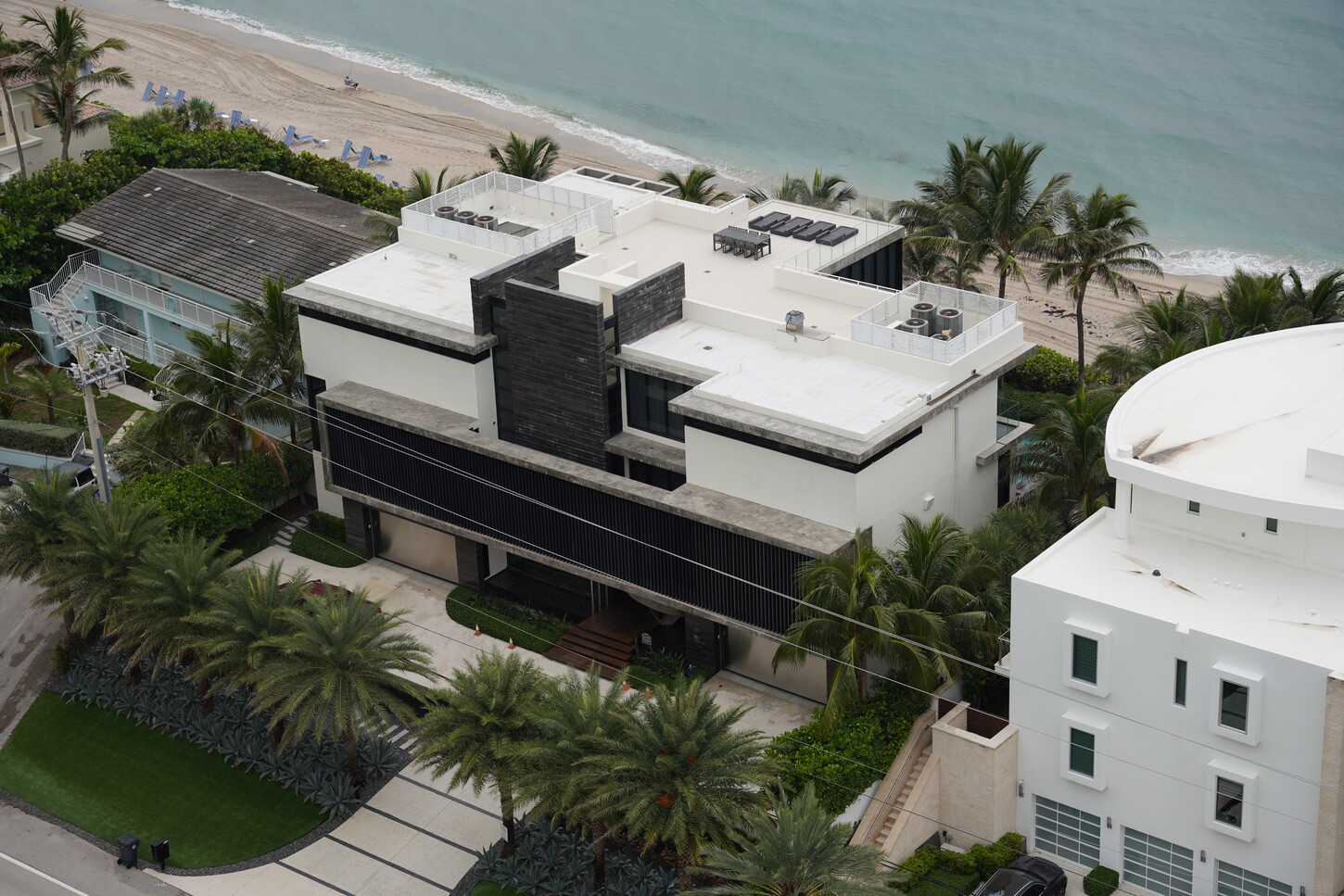 Aerial exterior view of a modern oceanfront home renovation in Boca Raton, Florida