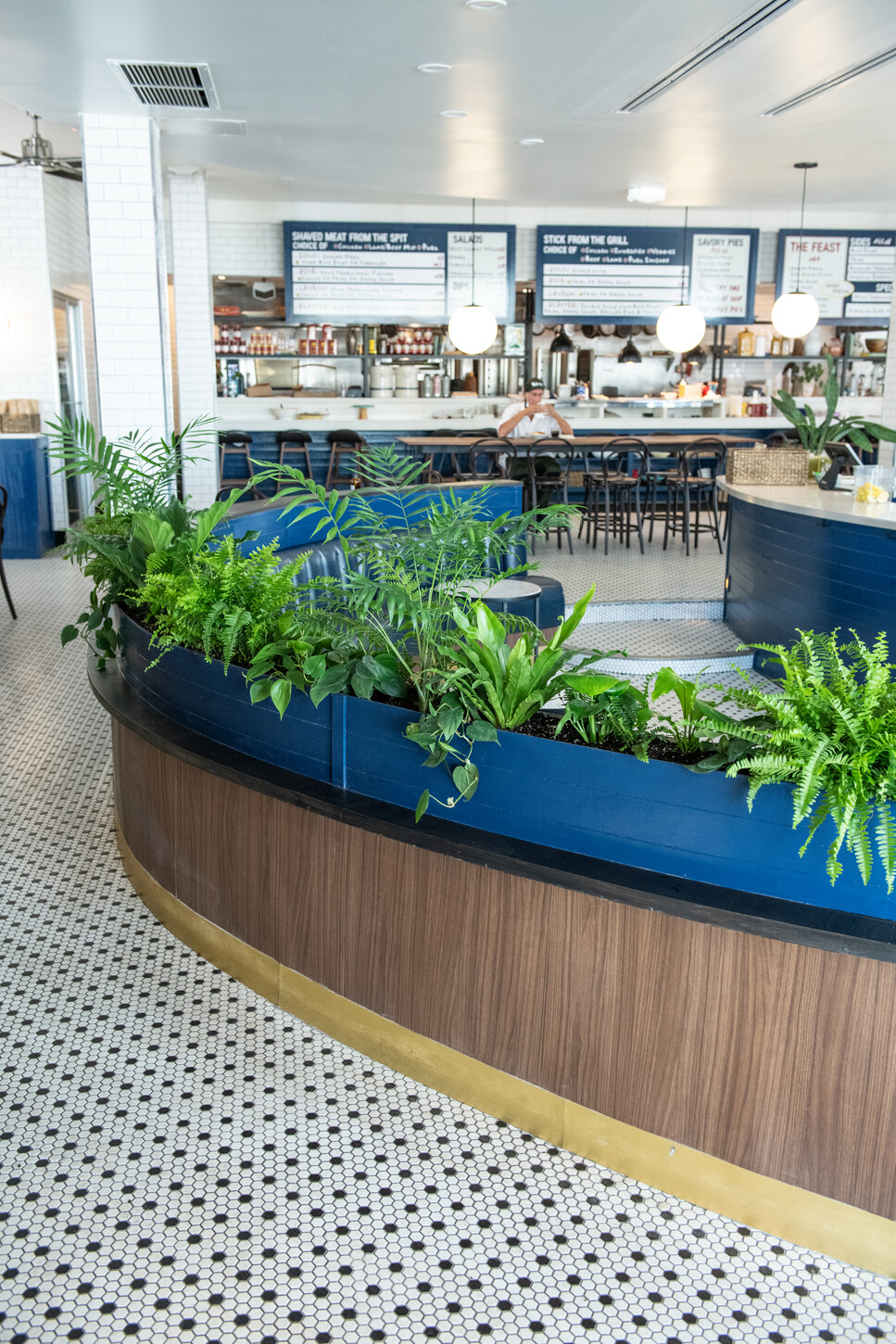 Curved Bar and Banquette Build-Out project by CM Custom Design