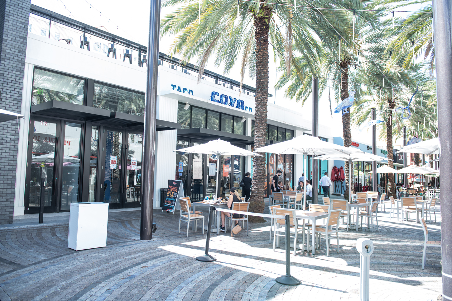 Coyo Taco restaurant interior mural and patio storefront renovation by CM Custom Design in Miami