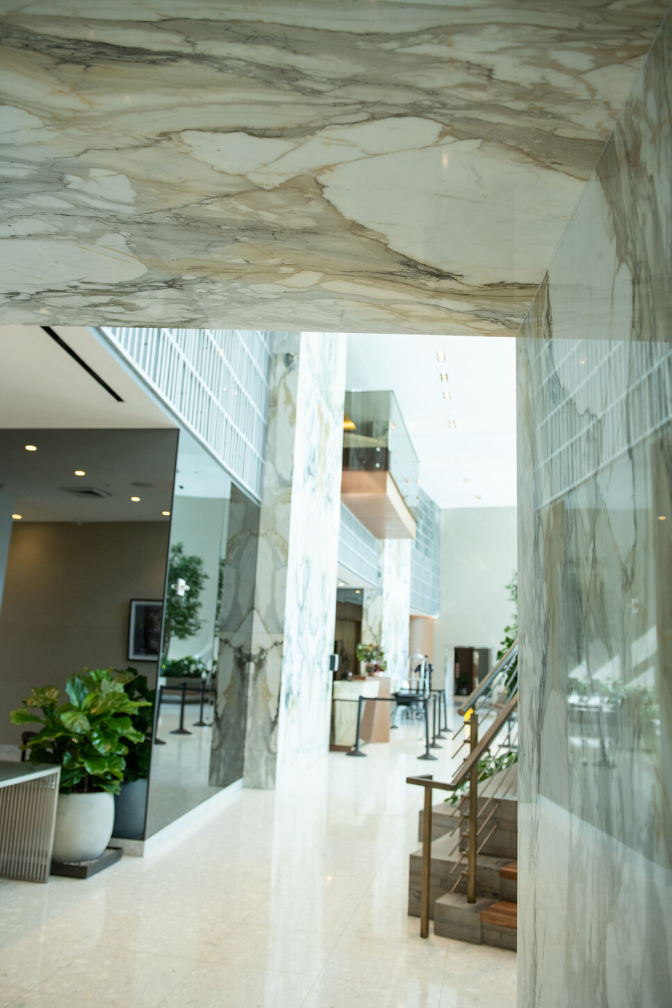 Marble atrium columns and reception view in a Miami condo building
