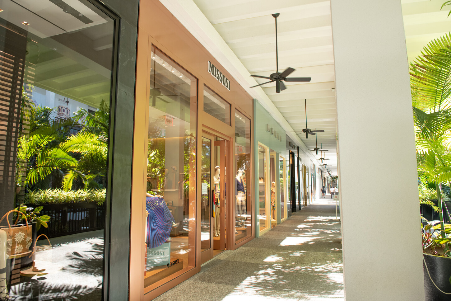 Close-up of custom wall display rack and storefront window detailing in the Missoni boutique