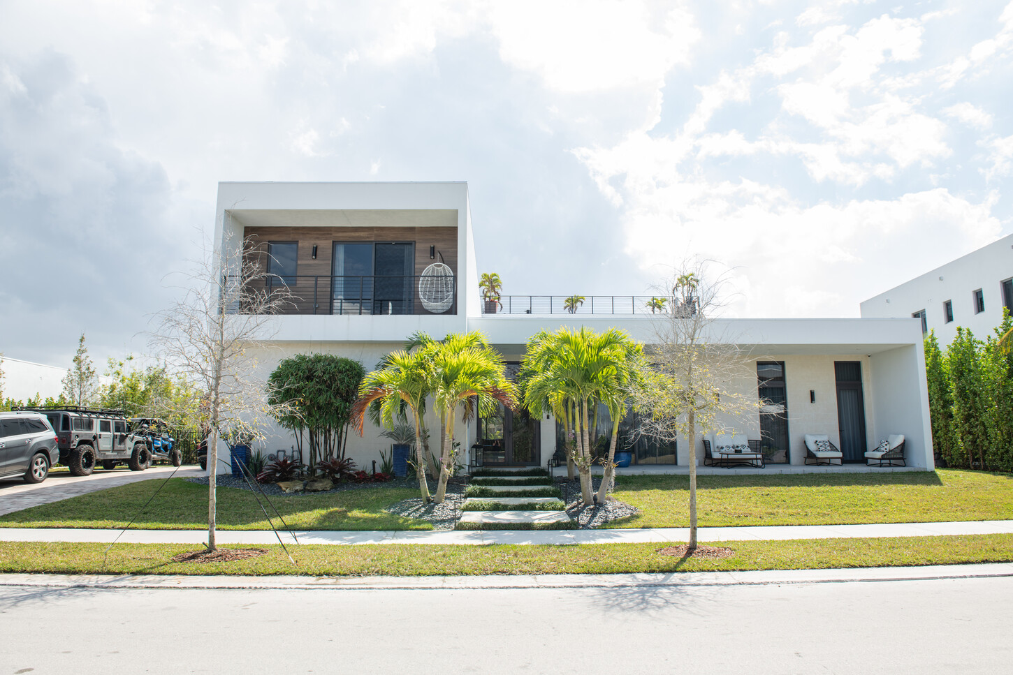 Modern Weston Botanico home exterior facade designed with custom millwork throughout by CM Custom Design