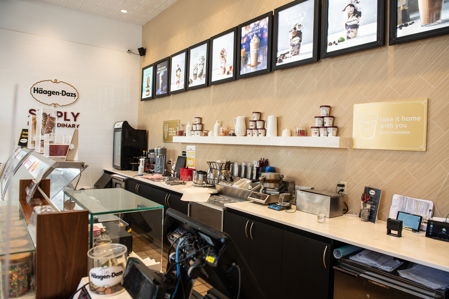 Back-of-counter service and equipment station finished to match the Häagen-Dazs Miami front-of-house design