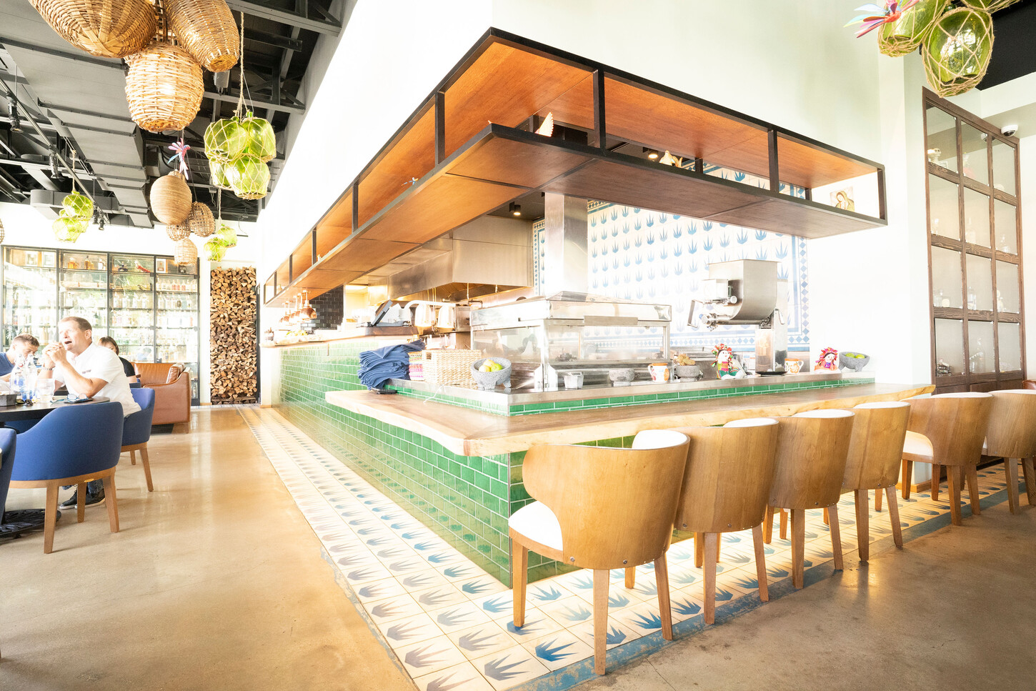 Wynwood restaurant interior fabrication: custom counter with barstools at Bakan in Miami