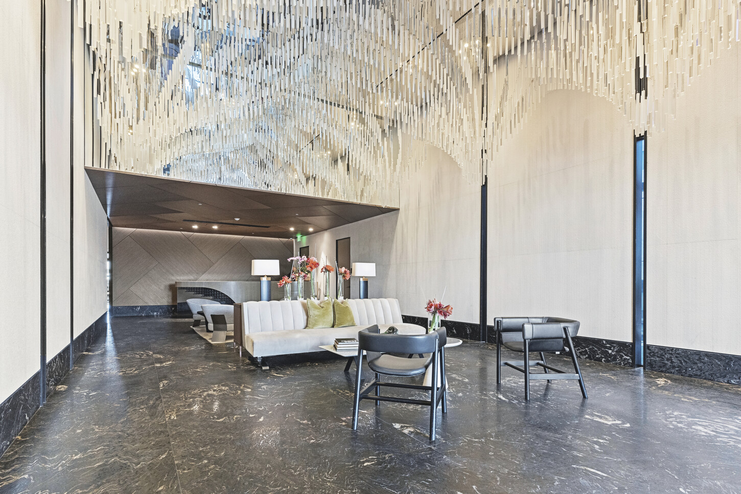 Lobby of the Muze Building in Sunny Isles, Miami, the waterfront tower housing this CM Custom Design residence.