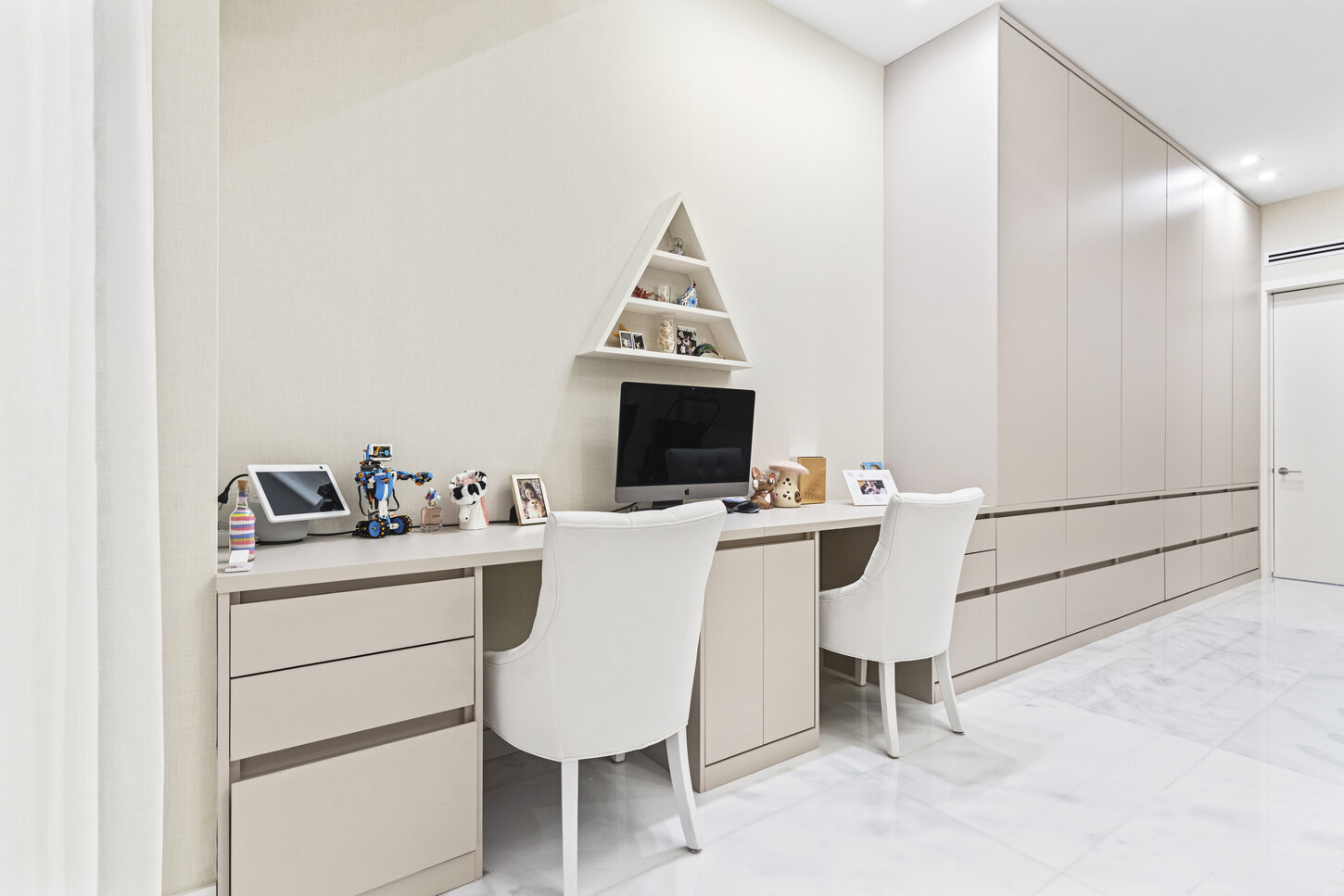 Built-in closet and storage cabinetry integrated into a home office, custom fabricated by CM Custom Design in Sunny Isles, Miami.