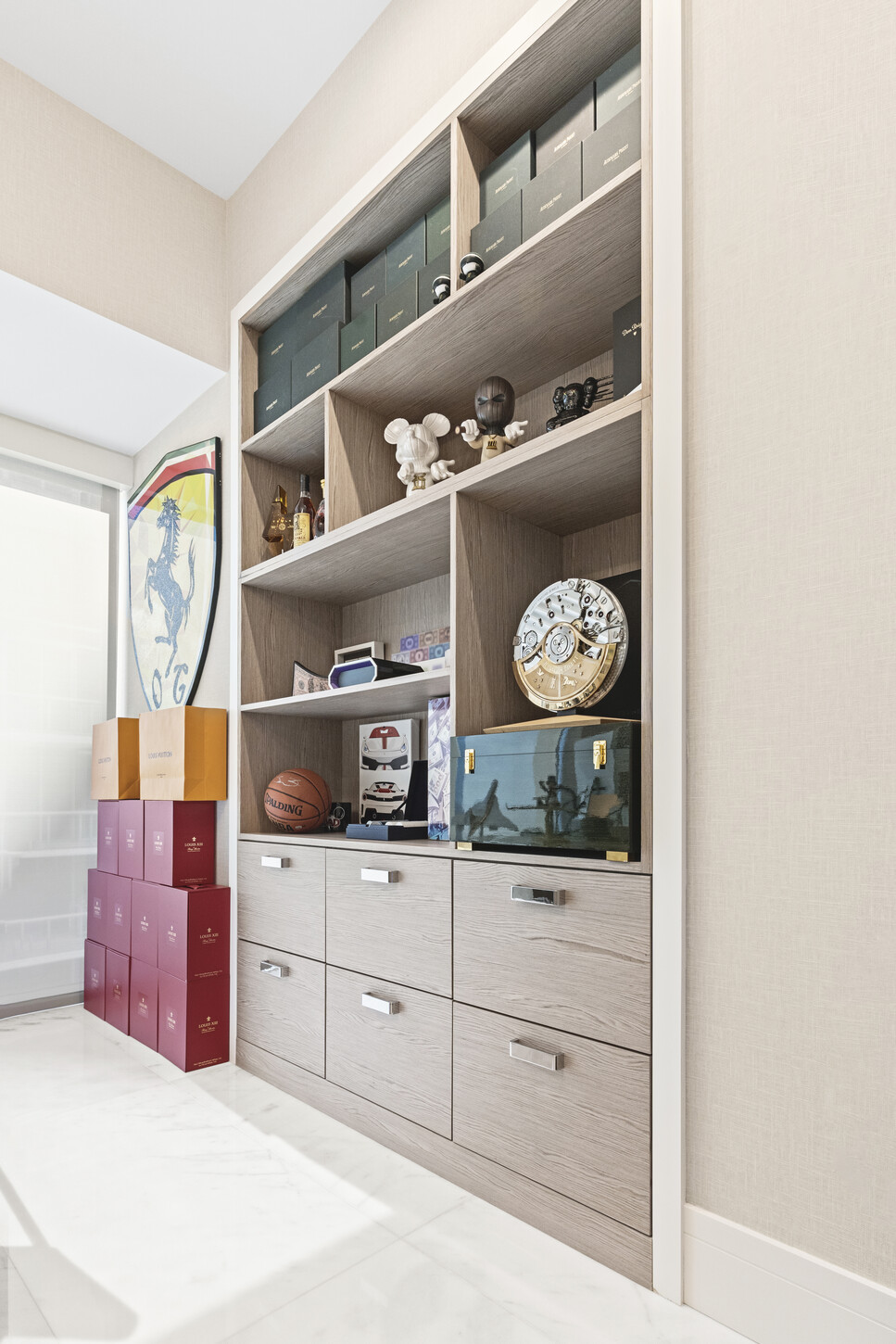 Custom closet system with organized built-in shelving and storage, designed by CM Custom Design in Sunny Isles, FL.