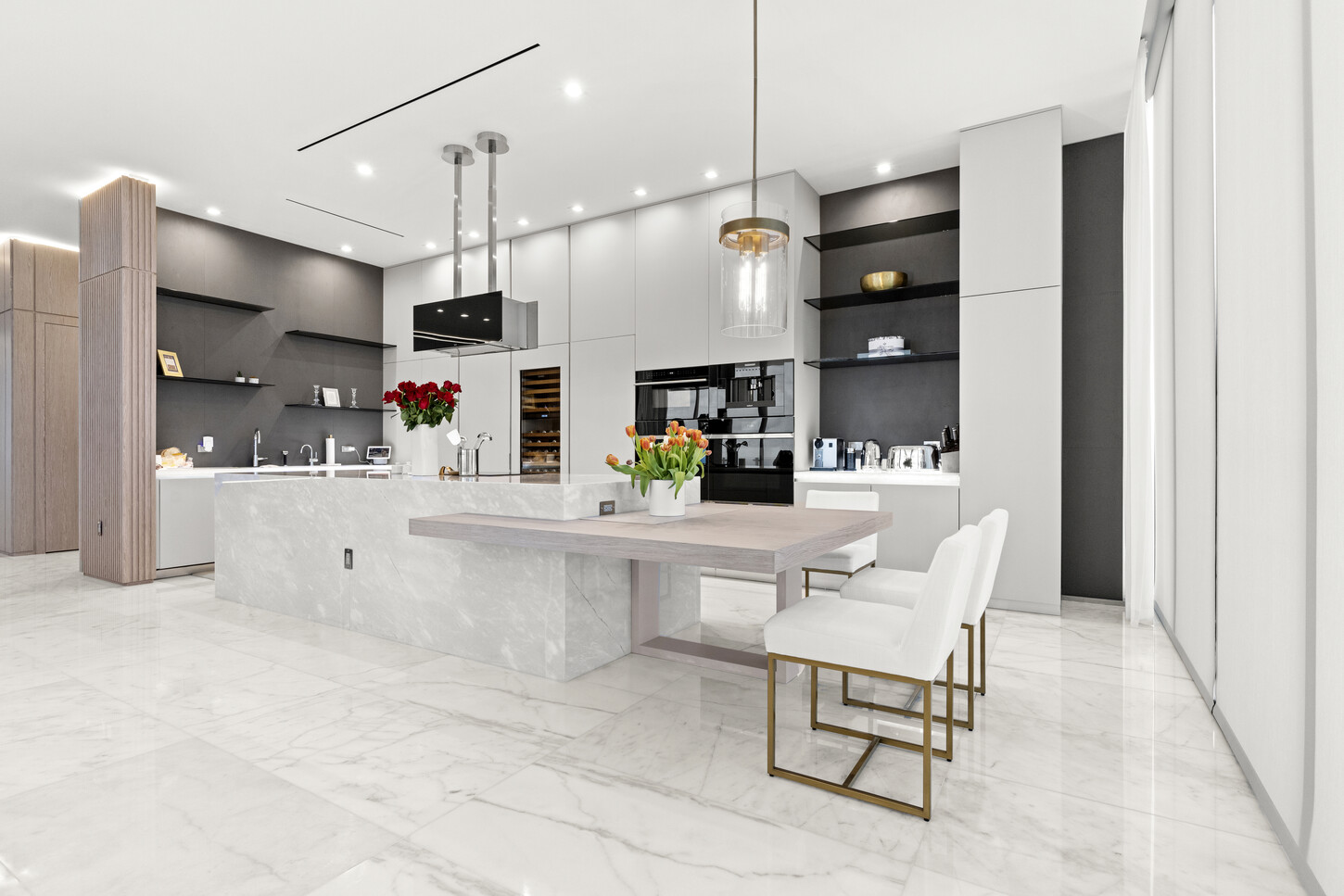 Custom kitchen cabinetry and marble island, fabricated and installed by CM Custom Design in a Sunny Isles, Miami residence.
