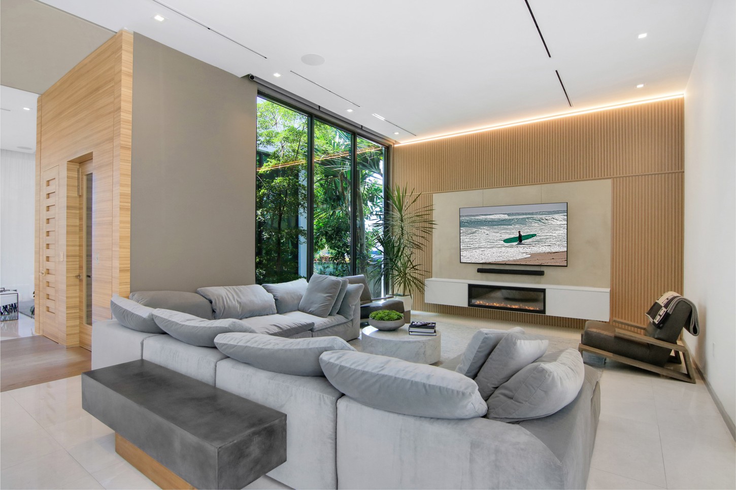 Living room wood wall panels and TV wall unit with LED lighting in North Miami