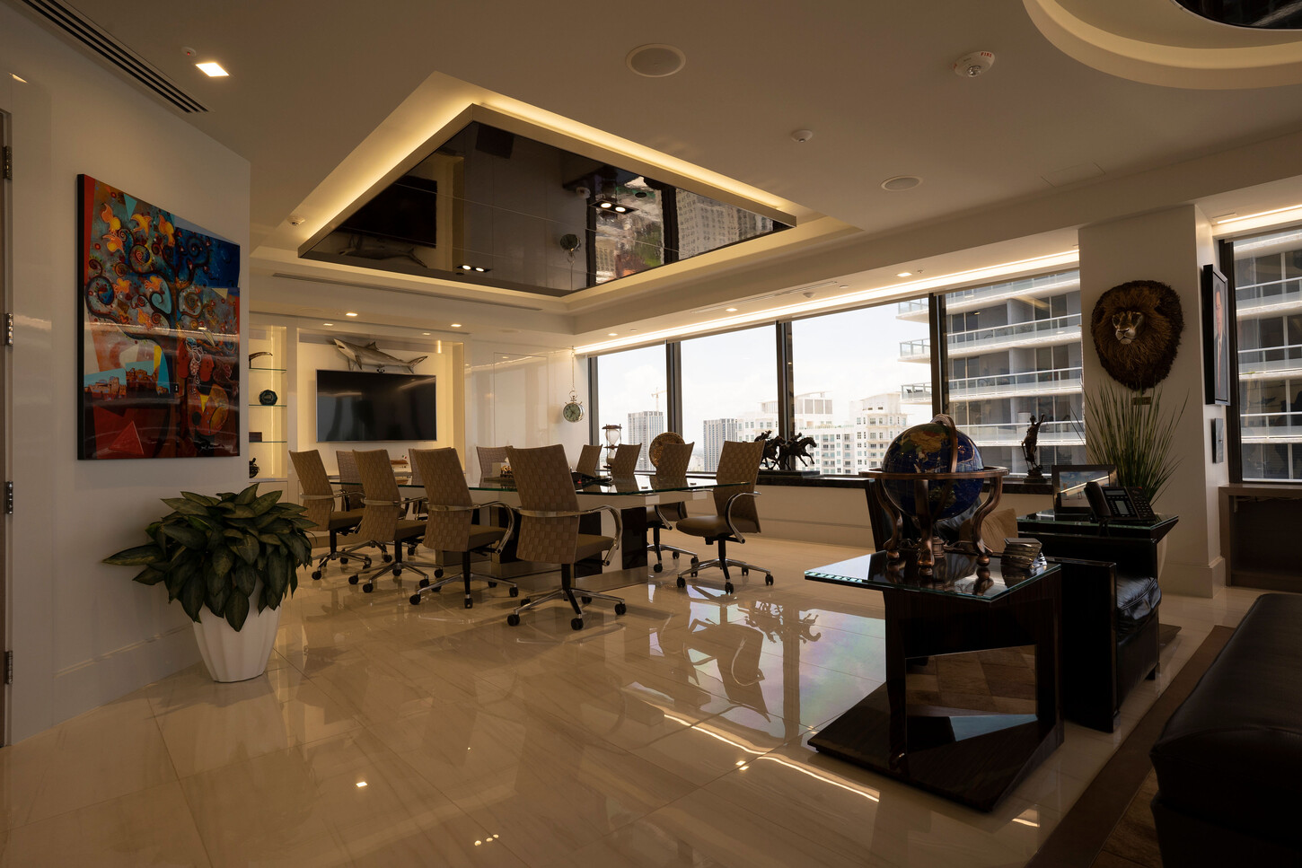 Zarco law firm boardroom in Florida with a mirrored coffered ceiling and a long conference table