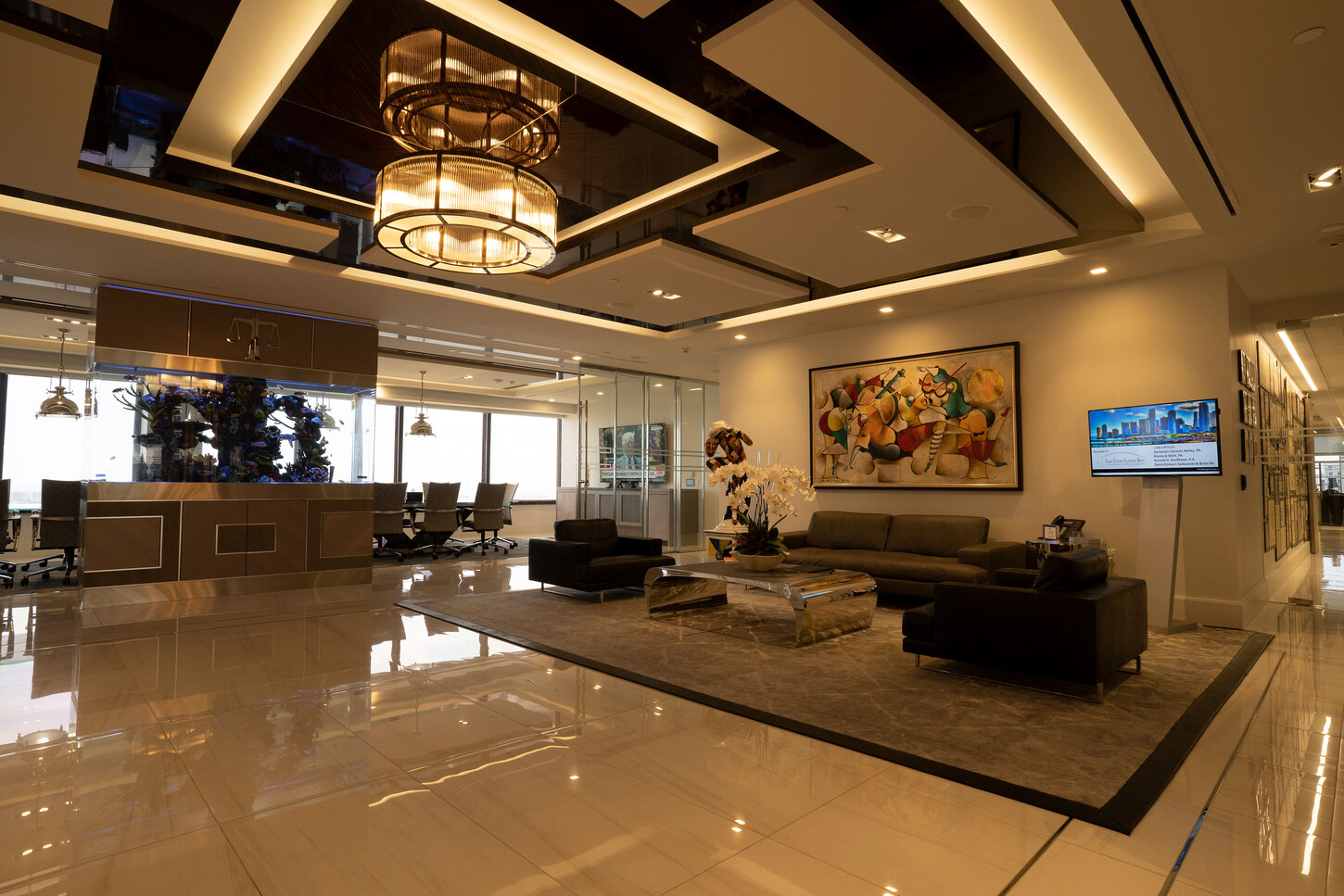 Lobby lounge seating under decorative ceiling millwork at the Zarco law firm in Florida
