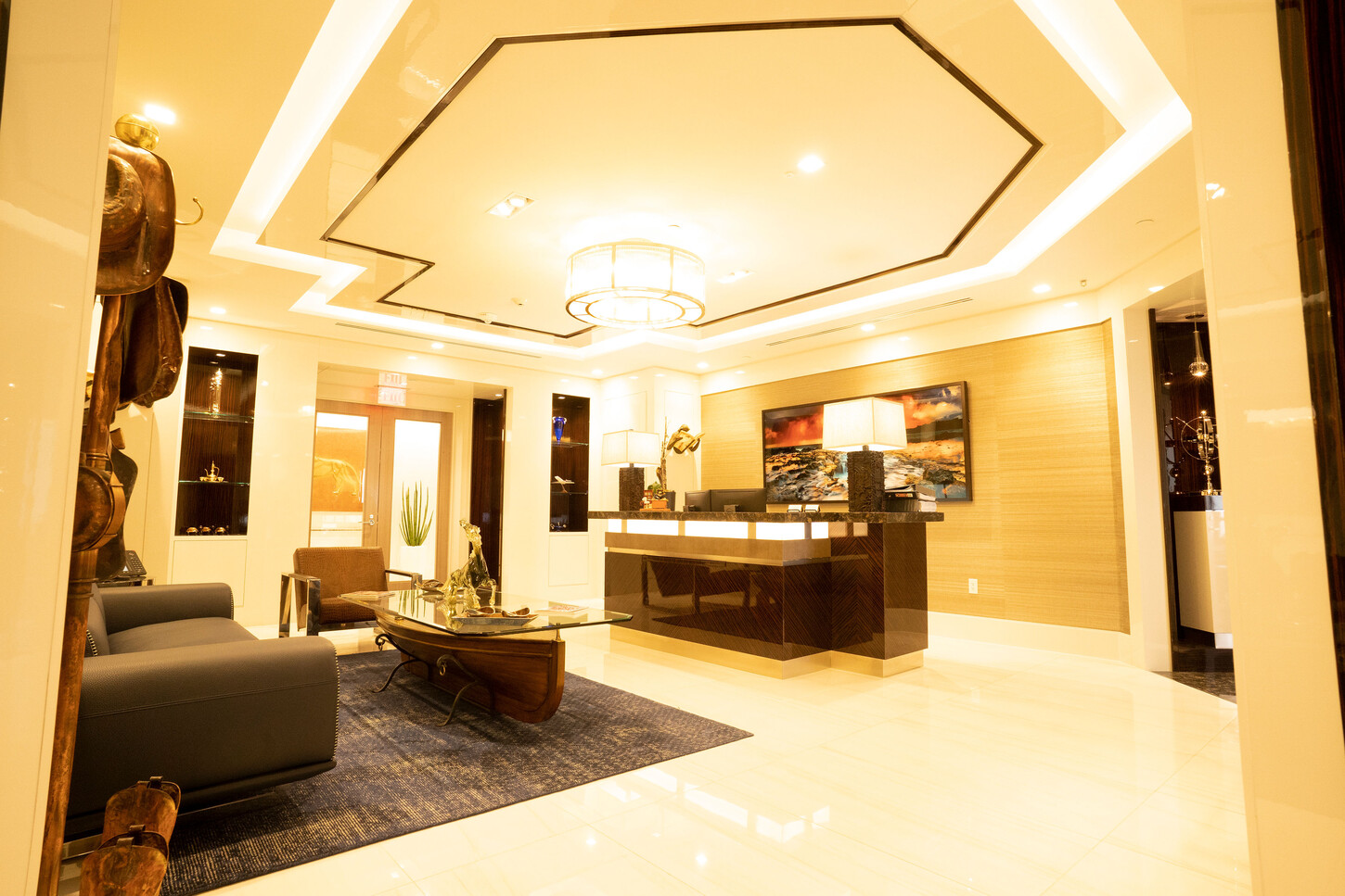 Reception seating area under a coffered wood ceiling at the Zarco law firm in Florida
