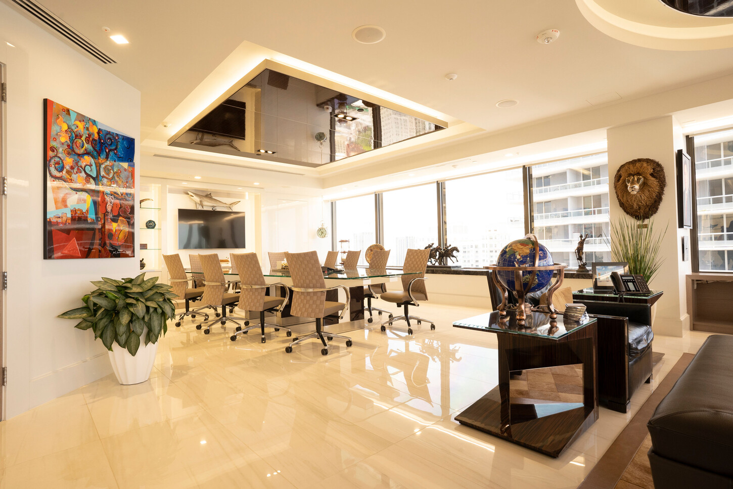 Zarco law firm boardroom in Miami with a mirrored ceiling and panoramic windows