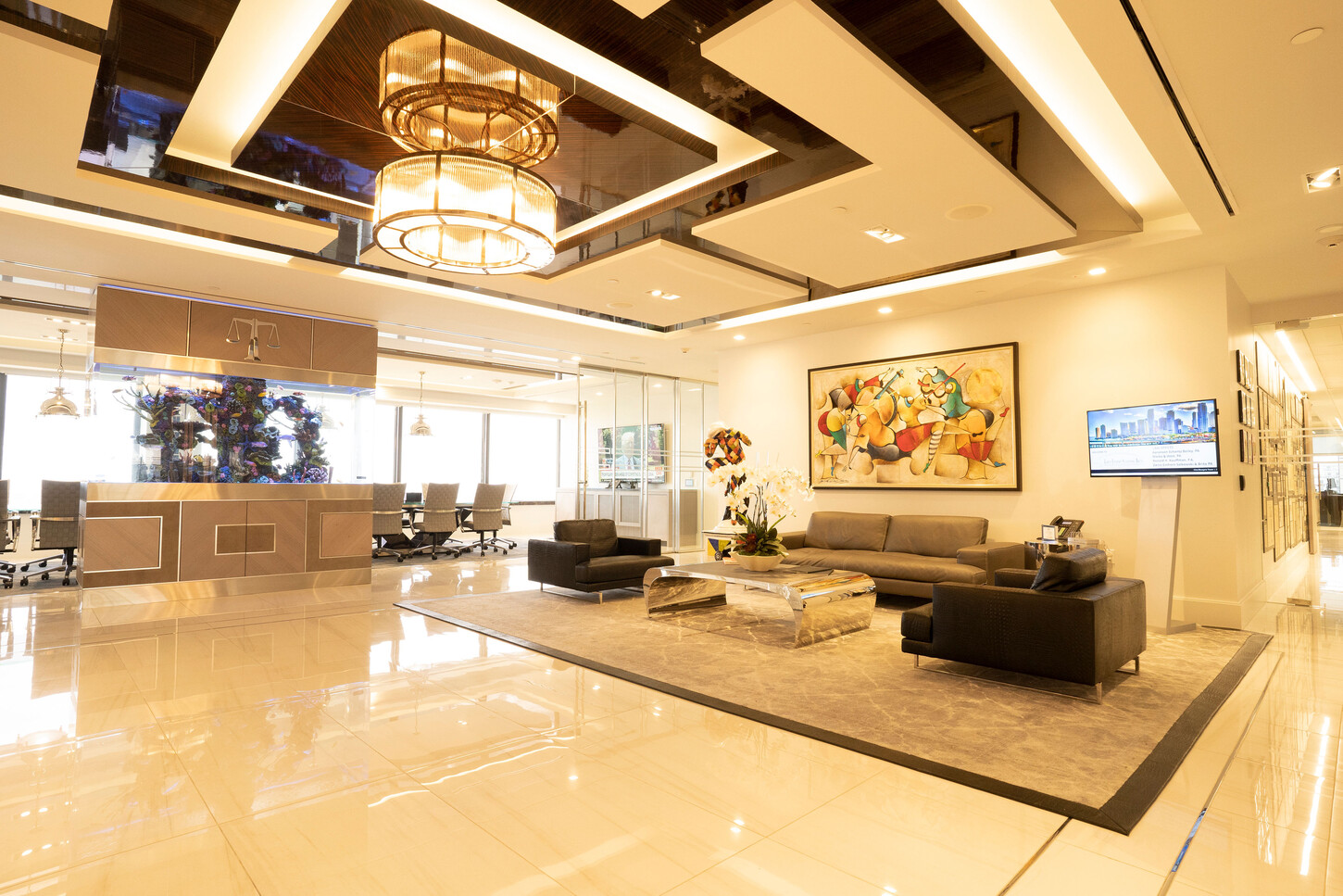 South Florida law firm lobby lounge with a custom ceiling system and an art wall